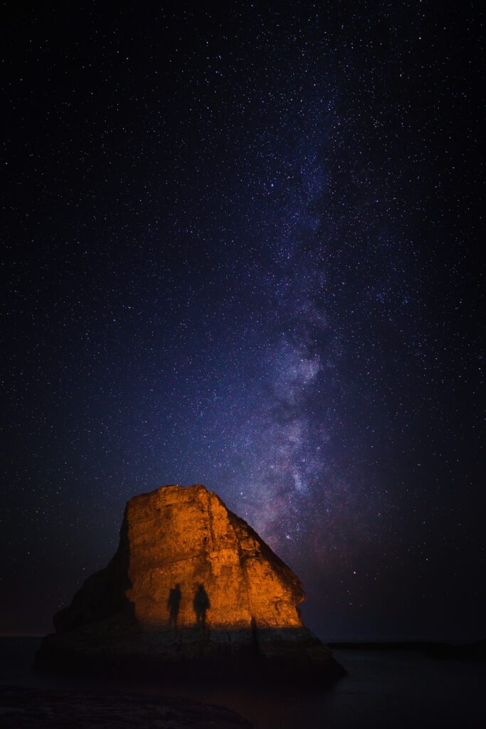 A night sky with the milky way in the background.