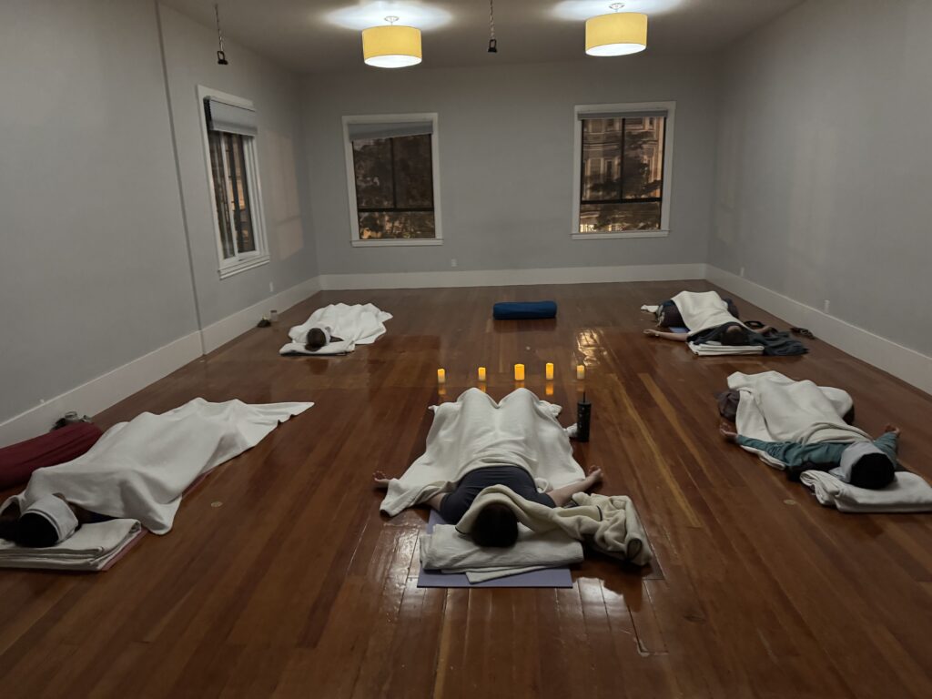 Yoga nidra practice at Folk Yoga during early spring in California, restorative and calming