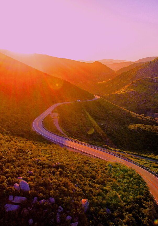 A road going through the middle of a valley.